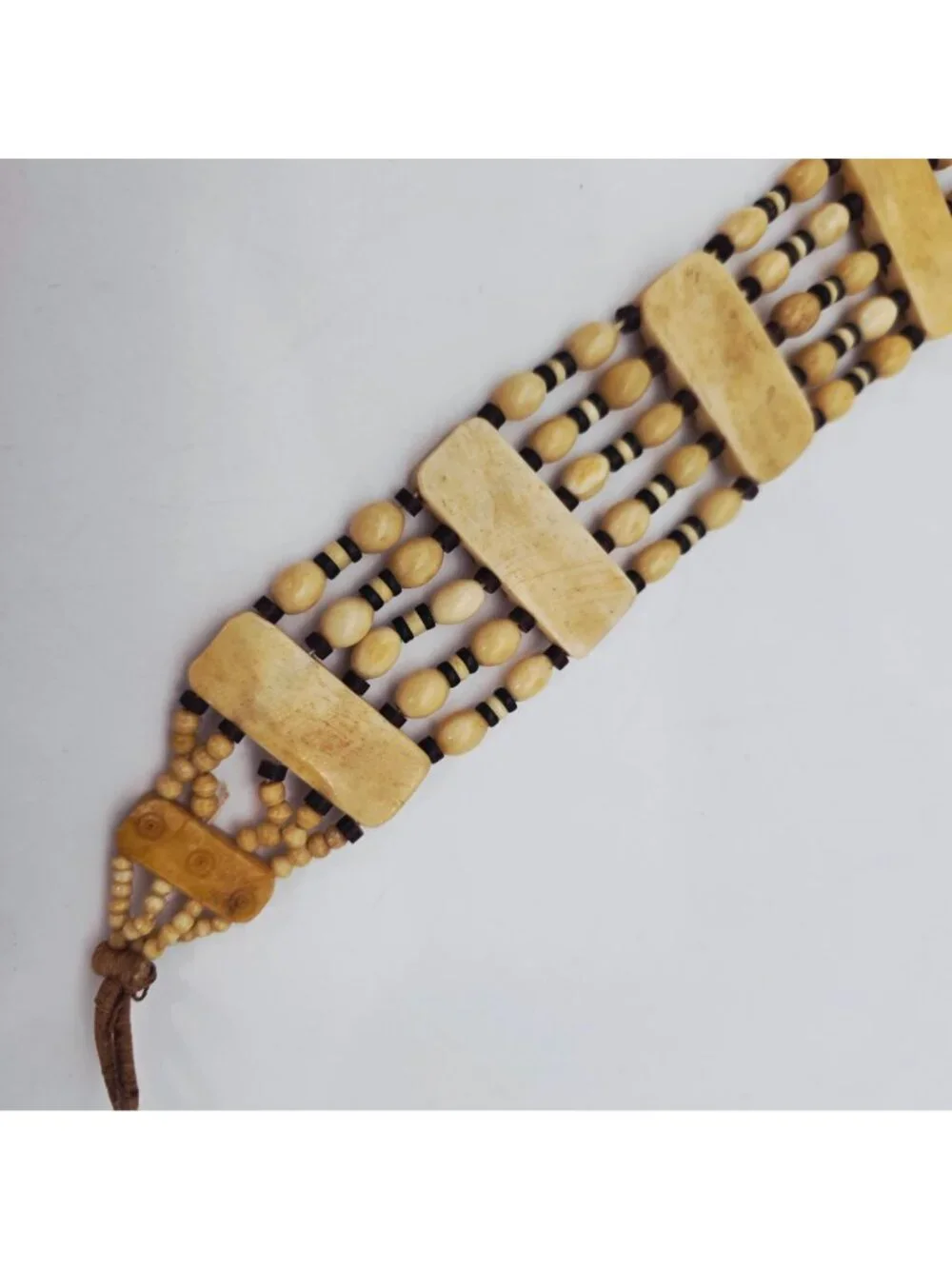 Hand-Carved Bone Beaded Belt With Intricate Leaf Pattern & Button Closure